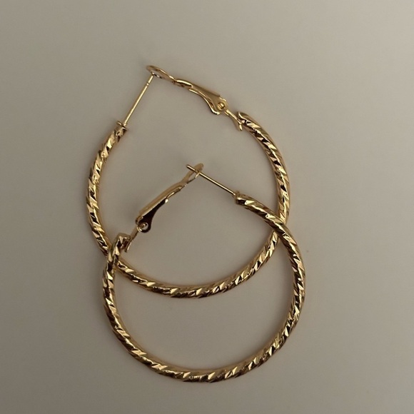 Twisted Wavy Gold Toned Hoop Earrings - Picture 3 of 3